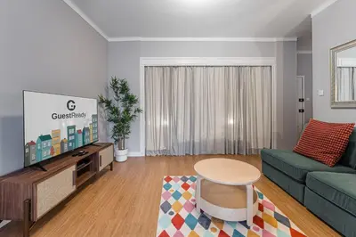 a living room with a couch and a table at GuestReady - A warm city refuge in Cedofeita in Porto