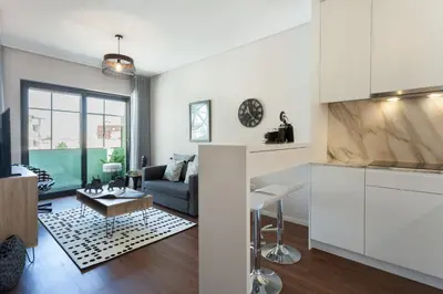 a living room with a couch and a table at Urban Views - ML 2Bed Apart Inspired by Casa da Música in Porto