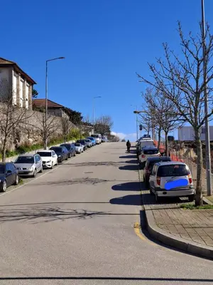 a street with cars parked on the side of the road at A Window to Porto - Pestana charming flat in Porto
