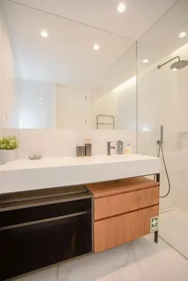 a bathroom with a sink and a mirror at Liiiving in Porto - Crystal Palace Apartment in Porto