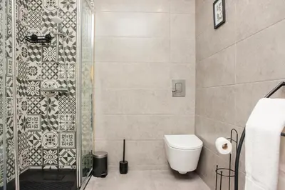 a bathroom with a toilet and a shower at Host Wise - Amadeo Apartments in Vila Nova de Gaia