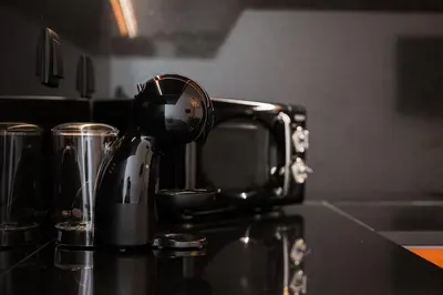 a coffee maker sitting on top of a counter at GuestReady - Sedona lodge near Palácio de Cristal in Porto