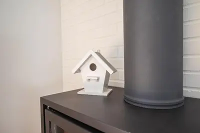 a bird house sitting on top of a table at Loft in Porto in Porto