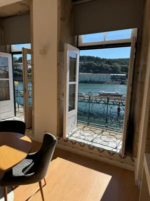 a red heart sitting on top of a building at luxury stay Romantic Douro River & Sunset views in Porto