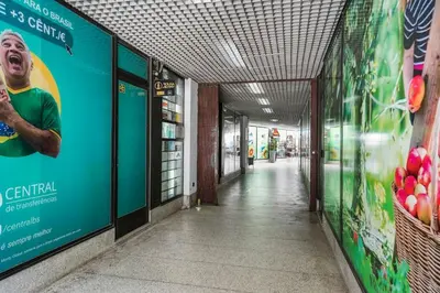a wooden door in a room with a wall at Constituição Flat by Amber Star Rent in Porto