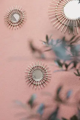 a pink wall with three mirrors on it at Coruja’s House AL OPO in Porto
