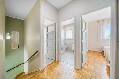 an empty hallway with a door and a bathroom at New Apartments Luiz I Bridge by Amber Star Rent in Vila Nova de Gaia