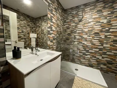 a bathroom with a toilet and a sink at Casas S. Dinis in Porto