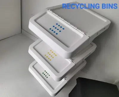 two white nintendo wii controllers sitting on a shelf at Loft in the historic center of Oporto downtown in Porto