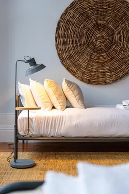 a couch with pillows on it in a room at Porto Premium Villa in Porto