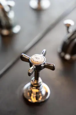 a bathroom sink with a faucet on a counter at Porto Premium Villa in Porto