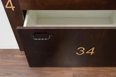 a wooden box with the number on it at Porto Hostel Cúpula in Porto