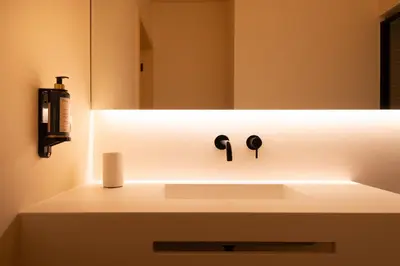 a bathroom with a sink and a mirror at Stylish Downtown Loft in Porto