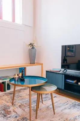 a coffee table in a living room with a tv at ORM - Cedofeita I Apartment in Porto