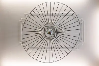 a ceiling with a clock in the middle of it at So Truly Porto in Porto
