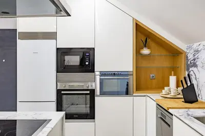 a bedroom with two beds and a mirror at Porto City Holidays by Douro River in Porto