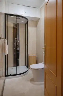 two beds in a hotel room with towels on them at Home Essences in Porto