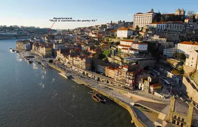 an aerial view of a city next to the water at Welcome to my city in Porto