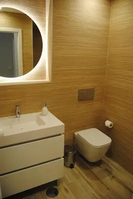 a bathroom with a sink and a toilet and a mirror at Gaia Loves You - Serra do Pilar in Vila Nova de Gaia