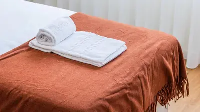 a pair of towels sitting on top of a bed at Urban Retreat Porto by LovelyStay in Porto