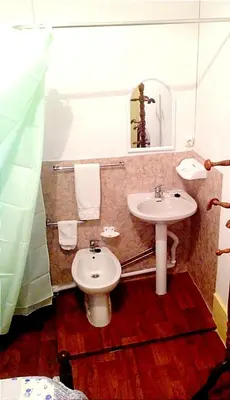 a bathroom with a sink and a toilet at Porto Chique AL 3 in Porto