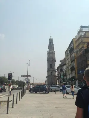 a city street with a clock tower in the distance at Porto Chique AL 3 in Porto