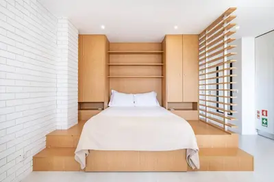 a bedroom with a large bed in a room at VIVA Marquês Studio in Porto