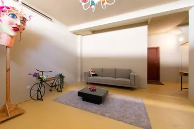 a living room with a couch and a table at Leote House - Studio 2 in Porto