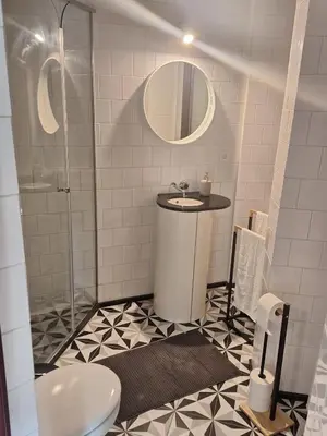 a bathroom with a shower and a sink and a toilet at Easy Host Porto in Porto