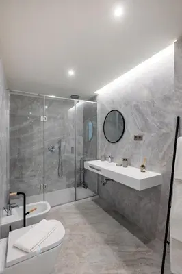 a bathroom with two sinks and a shower at Renovato Prestige in Porto