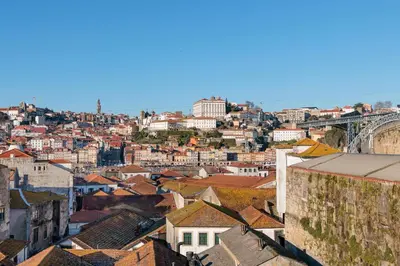 a view of a city with roofs and buildings at MyRiverPlace N 1 River View Porto apartments in Vila Nova de Gaia