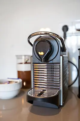 a toaster sitting on top of a counter at Almada 505 - Premium Flat in Porto