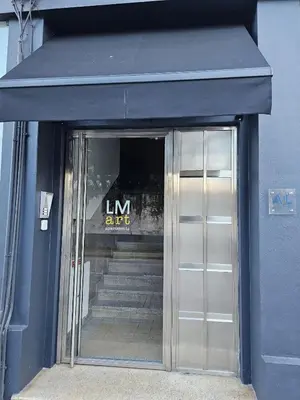 a restaurant with a buffet of food on display at LM art apartments in Porto