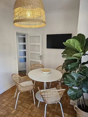 a white sink in a bathroom with a mirror at LM art apartments in Porto