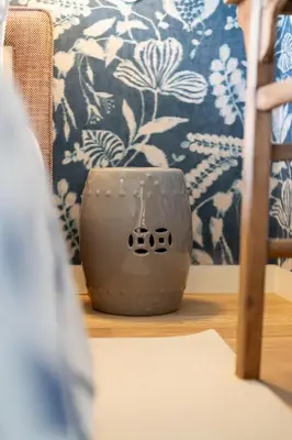 a vase sitting on a table in a room at Lóios 74 Suites by DA'HOME in Porto