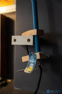 a tag is attached to a blue pipe at Y Trendy Arthouse Boavista in Porto