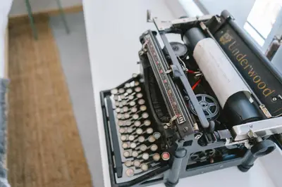 a close up of an old typewriter with a book at Porto serenity studio in Porto