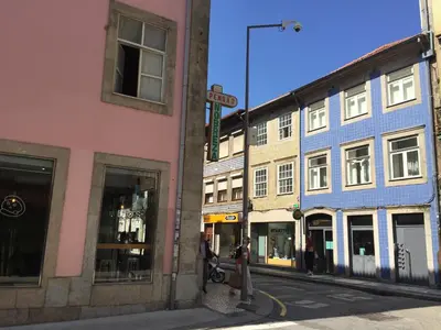 a group of buildings on a city street at Capim Dourado Apartments Cedofeita in Porto