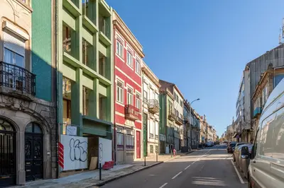 a street with colorful buildings on a city street at D&S - Alvares Cabral in Porto