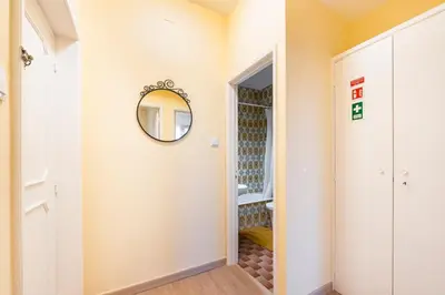 a hallway with a mirror on the wall at GuestReady - A pleasant stay in Porto in Porto
