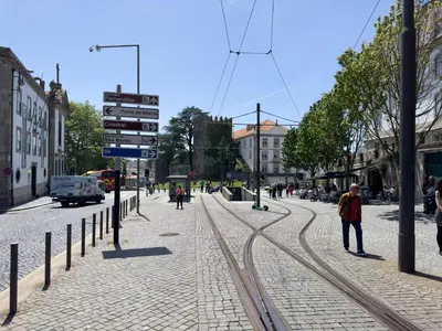 a street with people walking on the street at OPO Domus in Porto