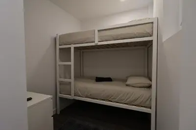 a bedroom with two bunk beds in a room at DOUROVIEW in Porto