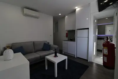 a living room with a couch and a table at DOUROVIEW in Porto