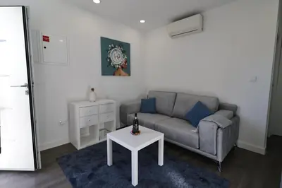 a living room with a couch and a table at DOUROVIEW in Porto