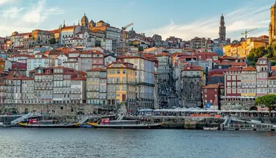 a view of a city with a river and buildings at PORTO GARDEN YARD APARTMENT in Porto