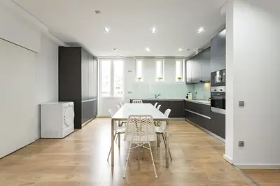 a living room with a couch and a table at Feel Porto Downtown Apartments & Studios in Porto