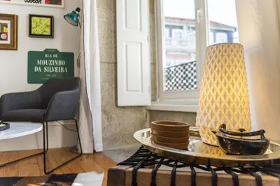 a living room with a table with a bowl on it at Mouzinho Penthouse by Hosty in Porto