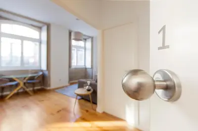 a room with a door with the number on it at Citybreak-apartments Sao Bento in Porto