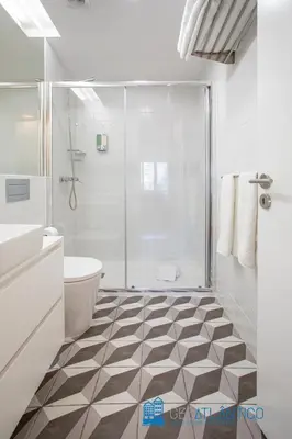 a bathroom with a shower and a toilet and a sink at Poveiros Oak Loft - Santo Ildefonso in Porto