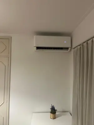 a room with a air conditioner on the ceiling at Oporto Music Flat - Very Central & Free Parking in Porto